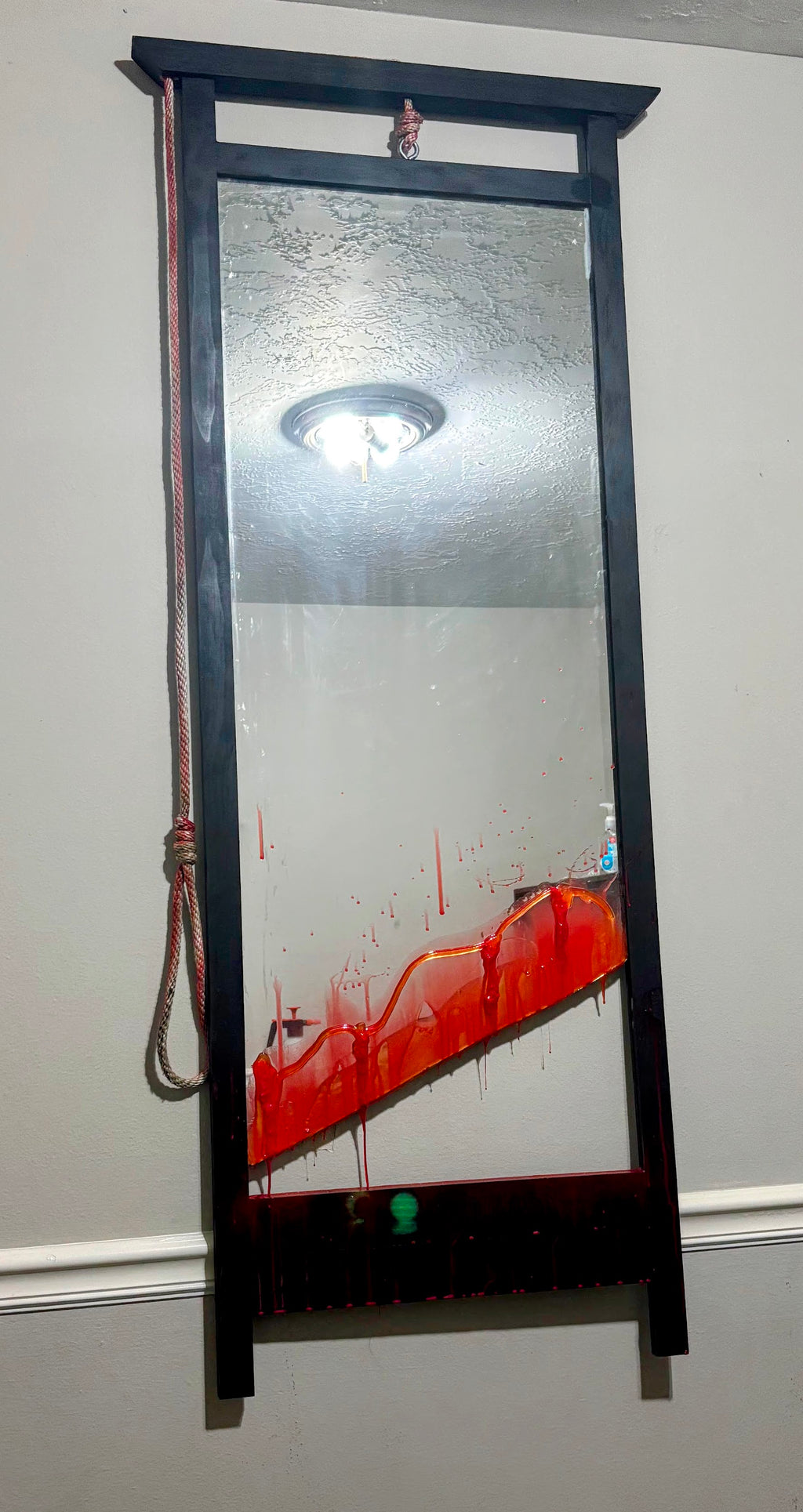 The Guillotine Mirror