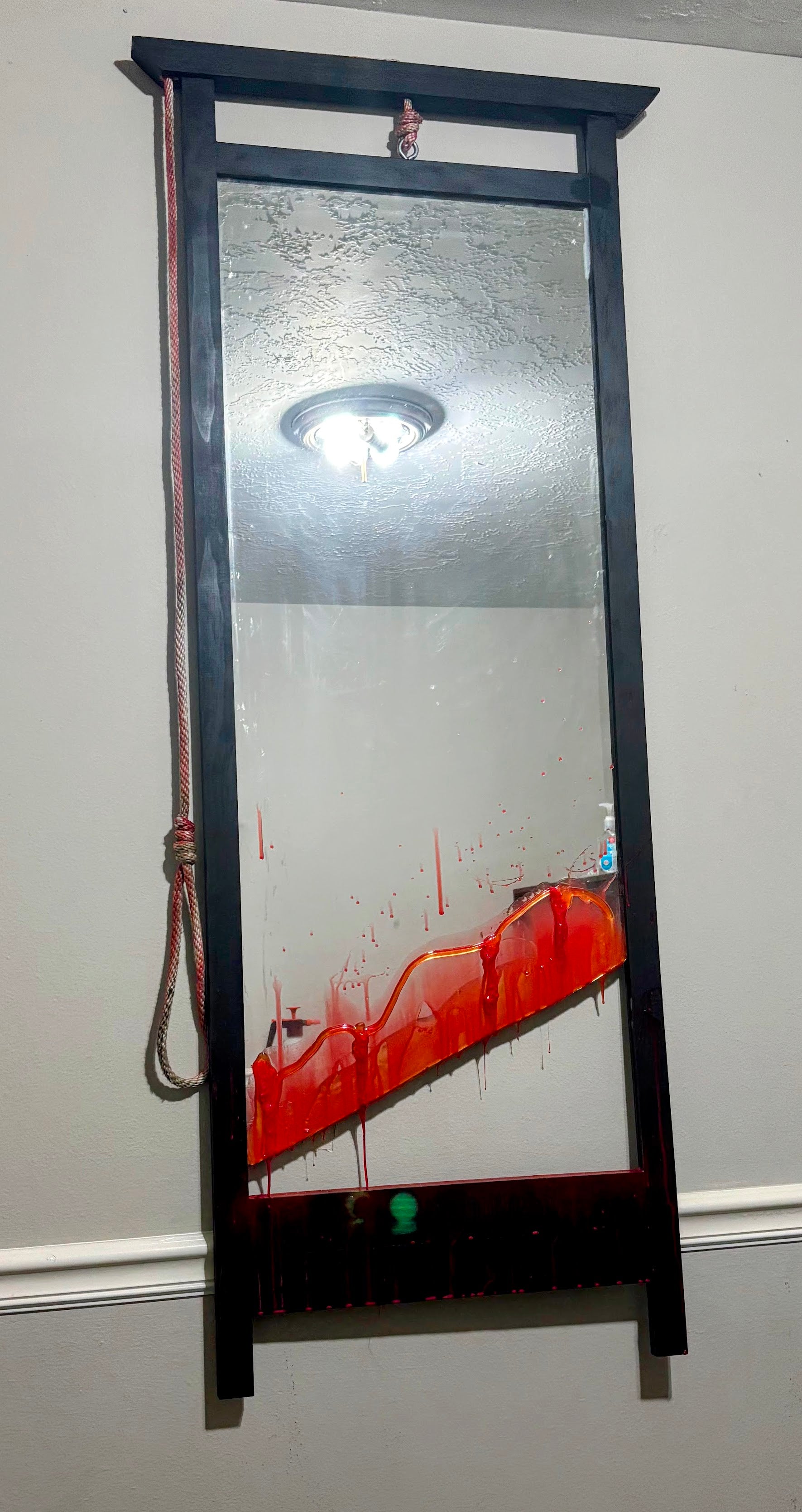 The Guillotine Mirror